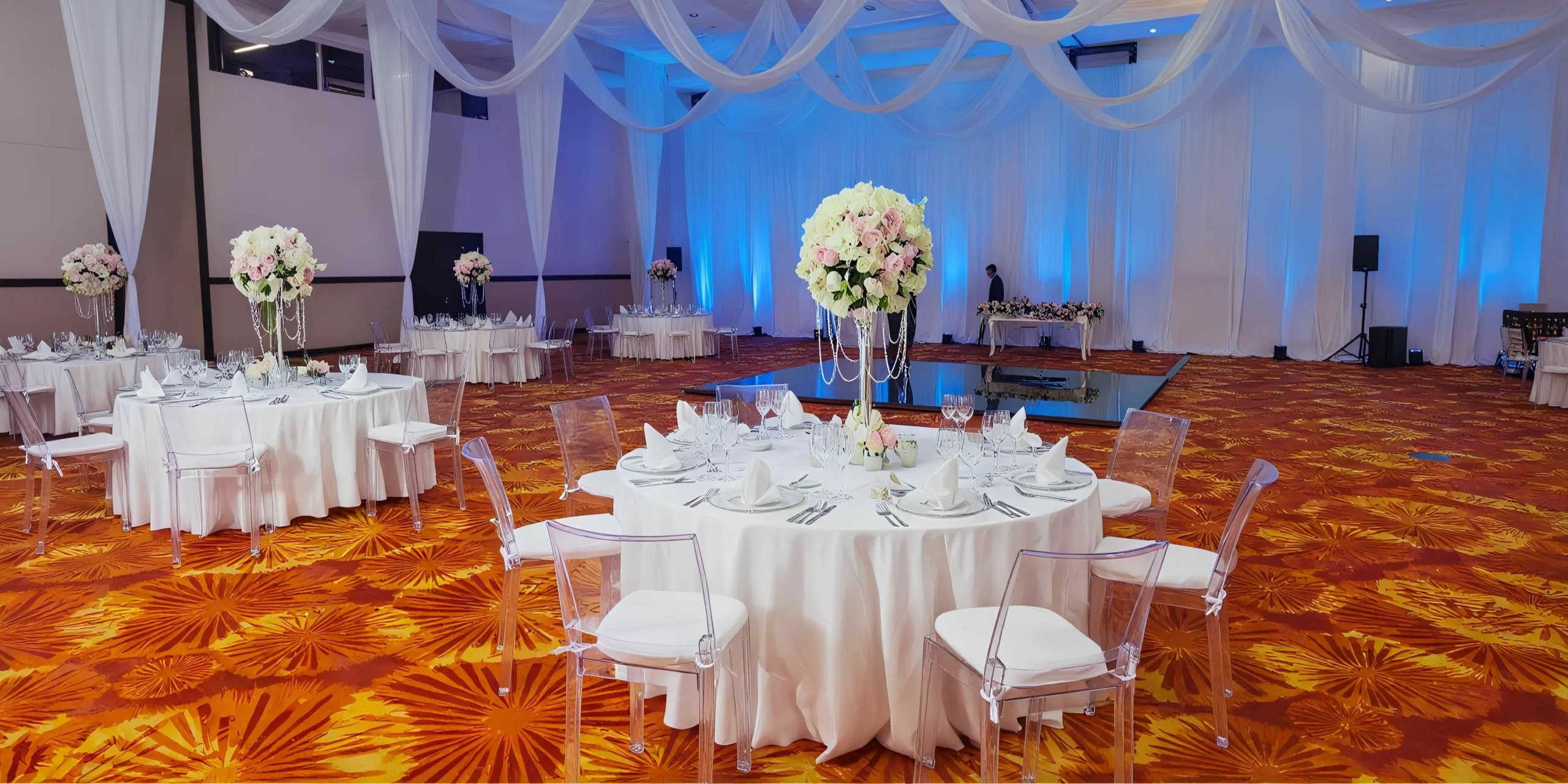 Elegant ballroom wedding reception setup at Dreams Vallarta Bay Resort & Spa