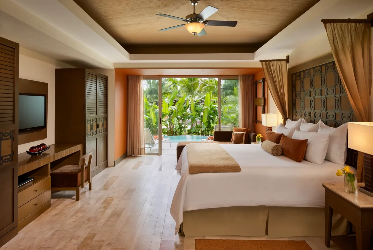 Junior Suite Swim Out king bedroom with terrace and pool access at Dreams Vallarta Bay Resort & Spa.