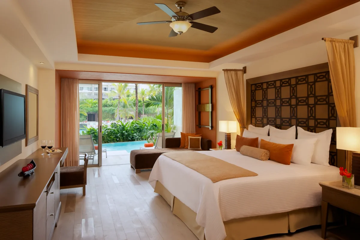 Preferred Club Junior Suite Swim Out King with terrace and pool access at Dreams Vallarta Bay Resort & Spa.